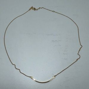 Tiffany T smile pendant in yellow gold, small.